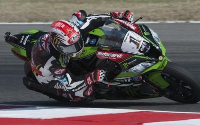 Rea shines in rain to take pole at Magny-Cours